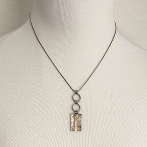 Vintage oxidized silvertone and brass geometric necklace pendant